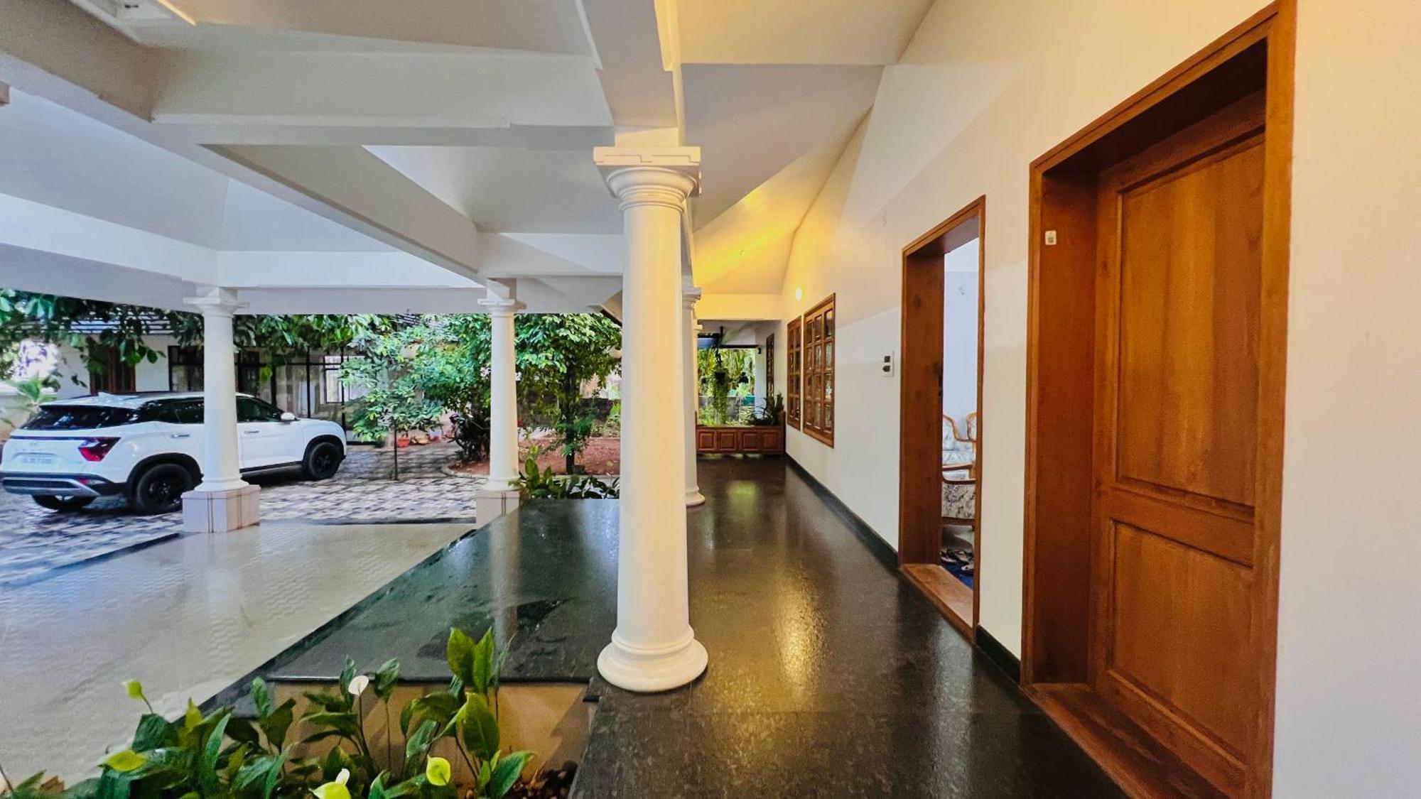 Waterfront By Palmyra Appartement Kollam Buitenkant foto
