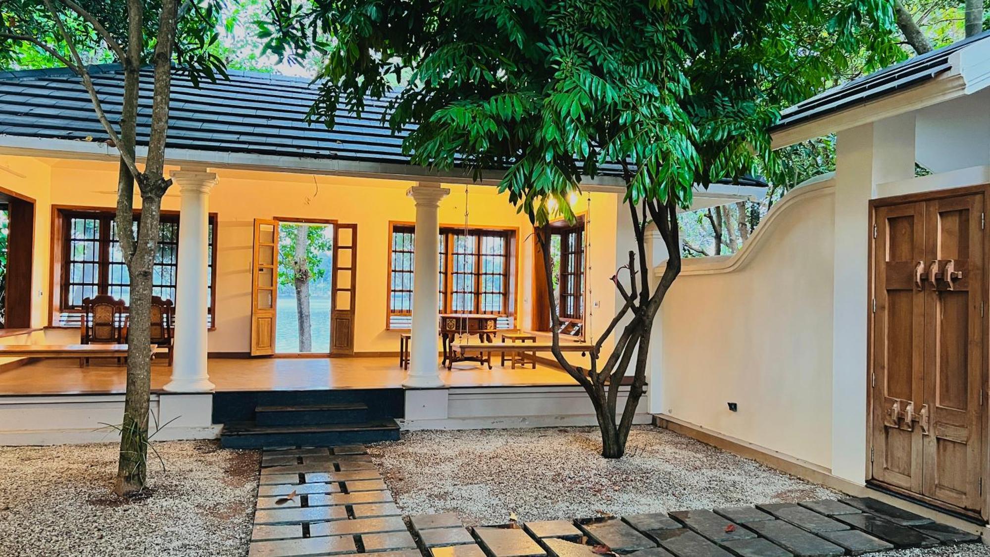 Waterfront By Palmyra Appartement Kollam Buitenkant foto