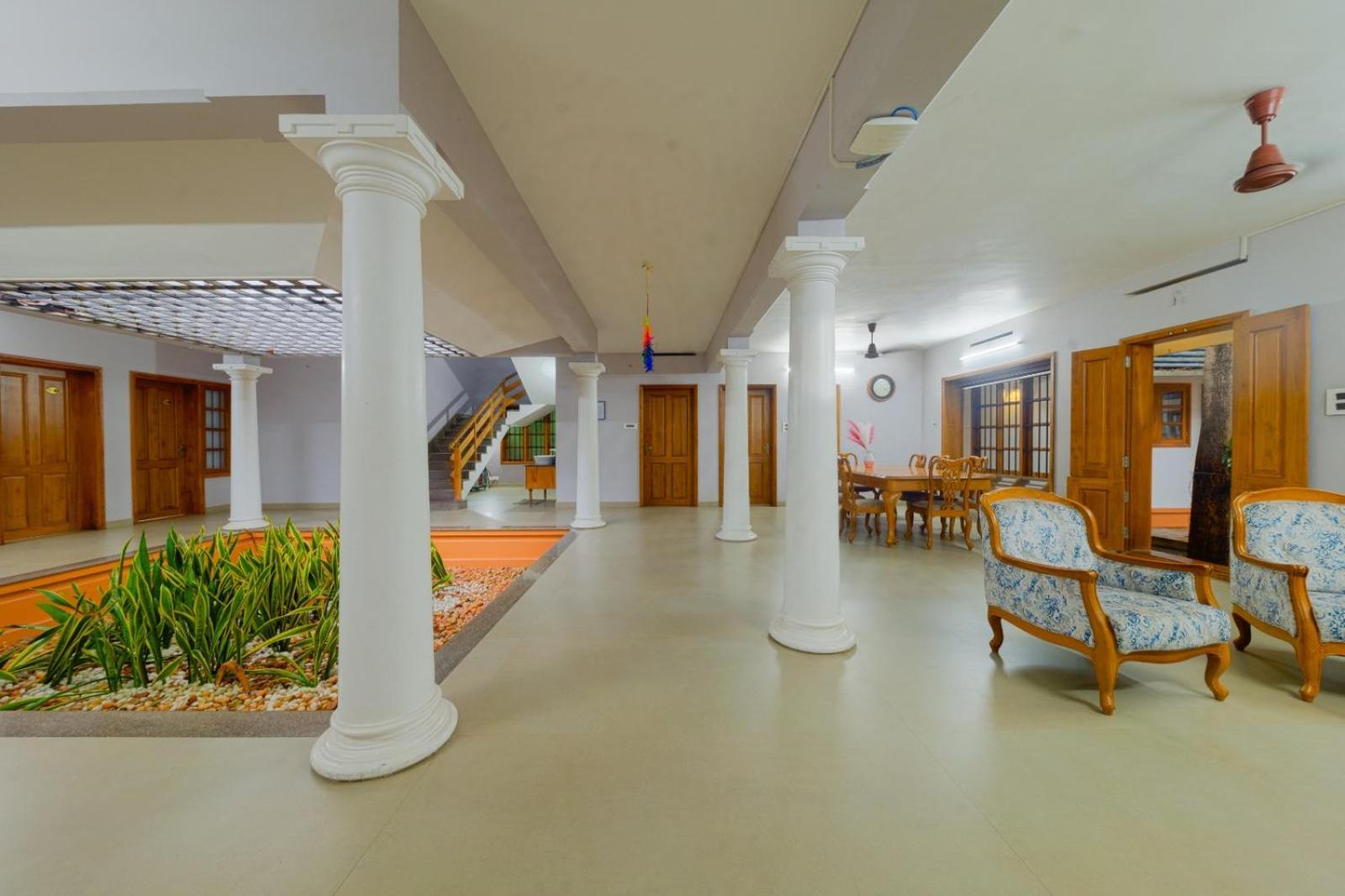Waterfront By Palmyra Appartement Kollam Buitenkant foto